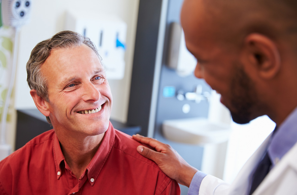 Patient smiling at doctor